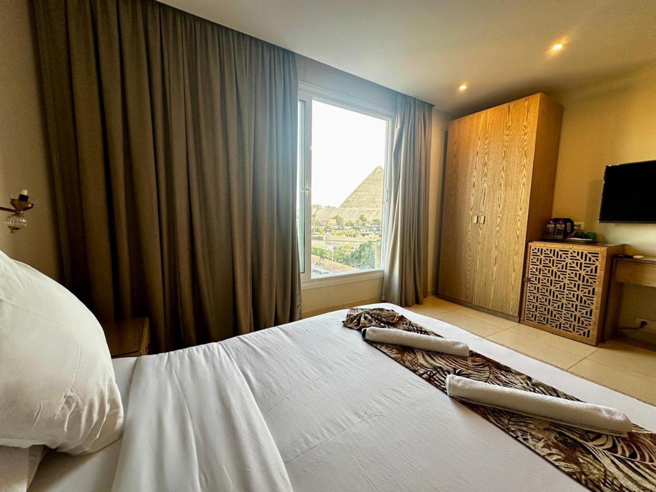 Doudou Pyramids View Hotel Kafret el-Gabal Eksteriør bilde